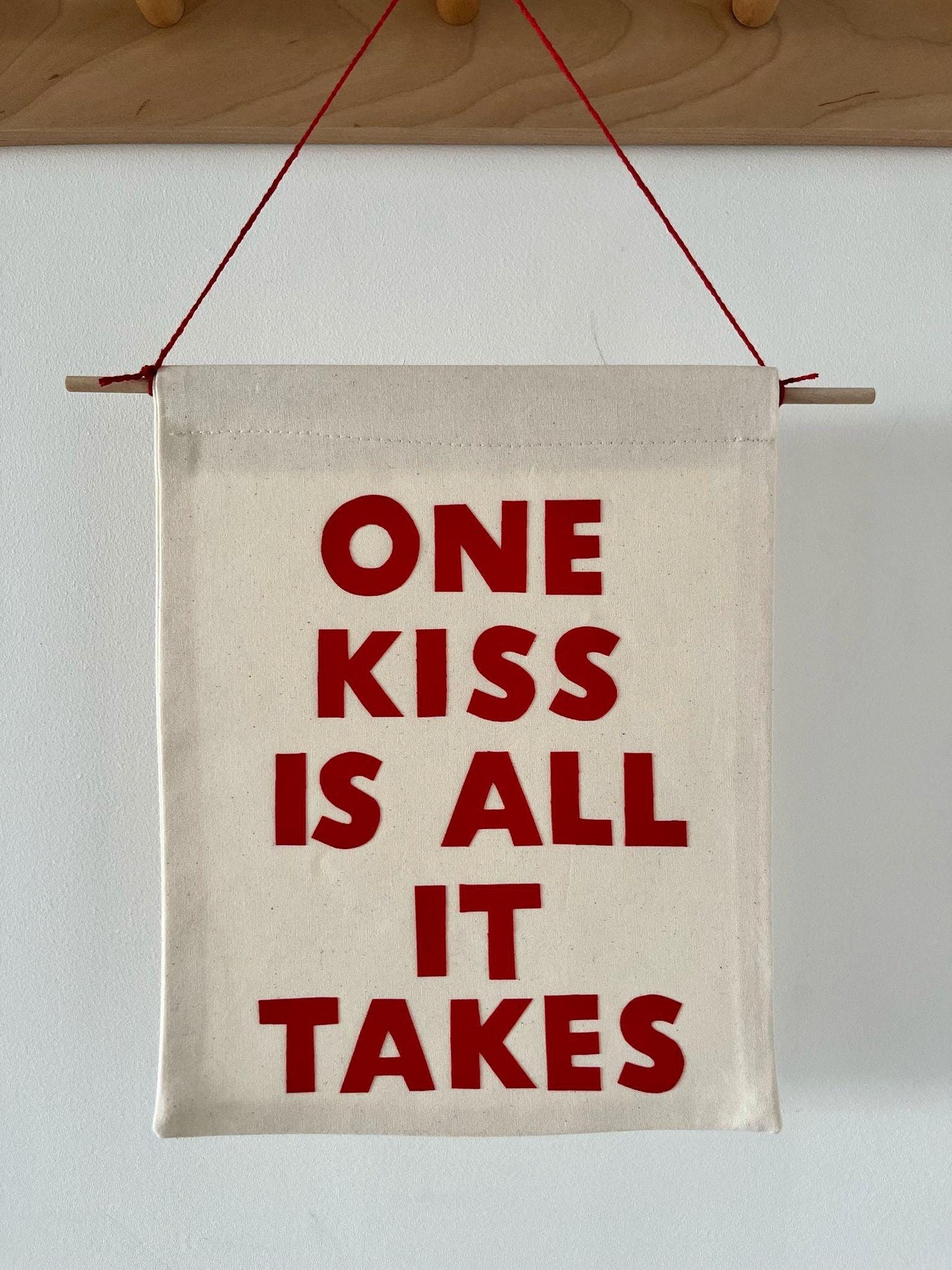 One Kiss Is All It Takes Pennant Flag